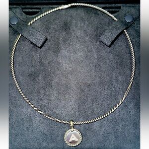 Authentic from DY Elegant Sterling Silver Necklace Brand New never used.